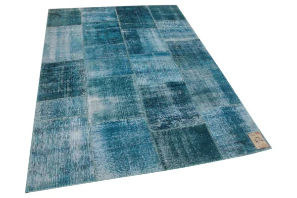 patchwork vloerkleed 240cm x 170cm showroom model. naadjes laat los