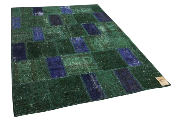 Paars patchwork vloerkleed 248cm x 175cm kleed heeft klein gaatje op de naad